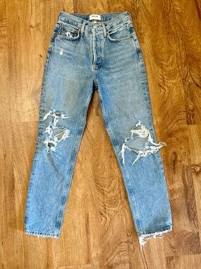 Distressed, Cropped AGOLDE “Fen” Button Fly Jeans. 23